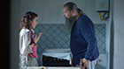 Woman and Man in tense face to face conversation